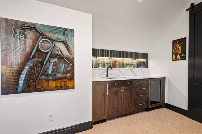 Wet bar with quartz counters and beverage center