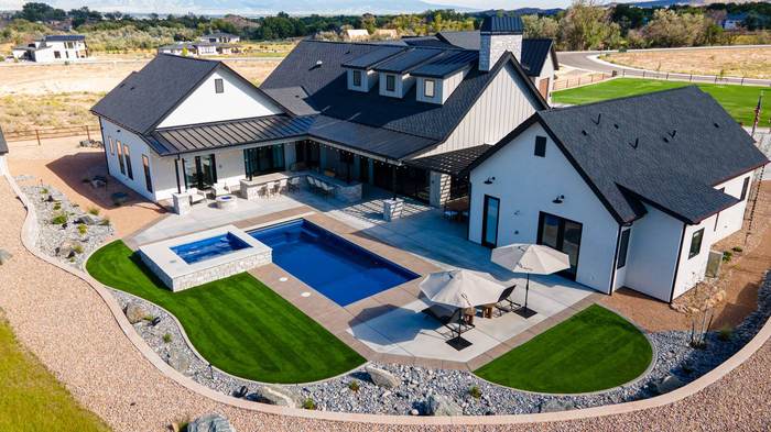 Backyard pool, spa, and covered outdoor kitchen
